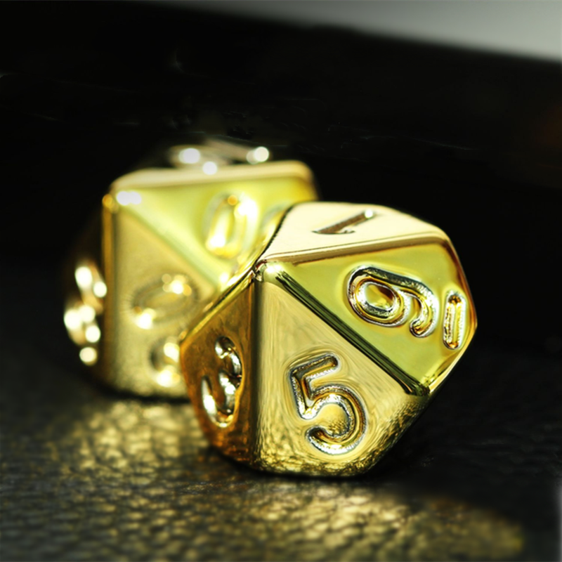 7 Peice set of gold plated dice