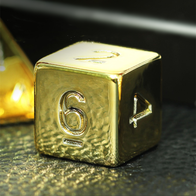 7 Peice set of gold plated dice